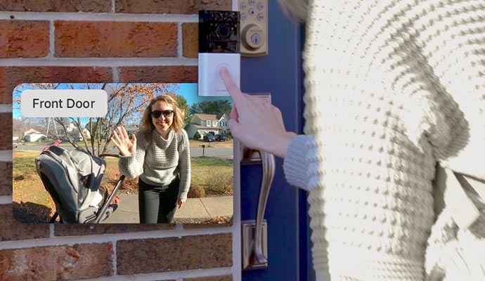 a woman using smart doorbell