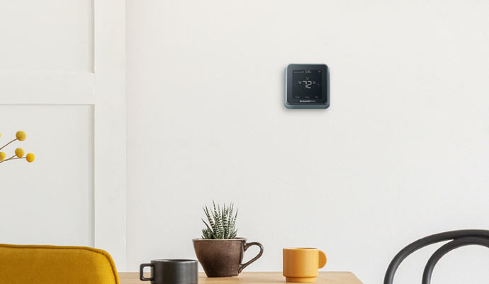 smart thermostat installed on wall