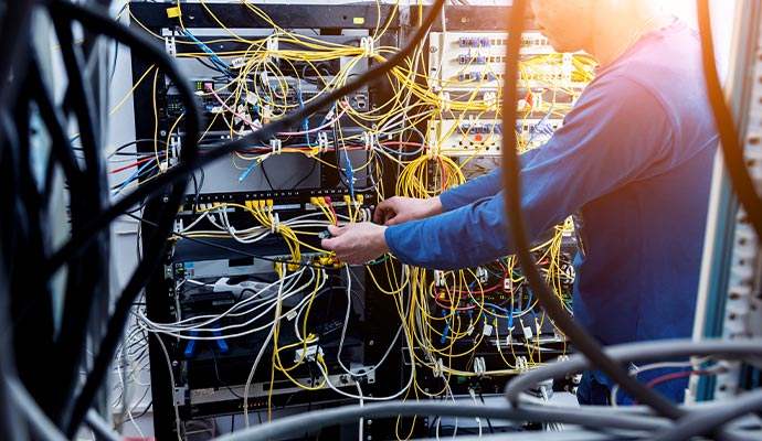 man working on optical fiber